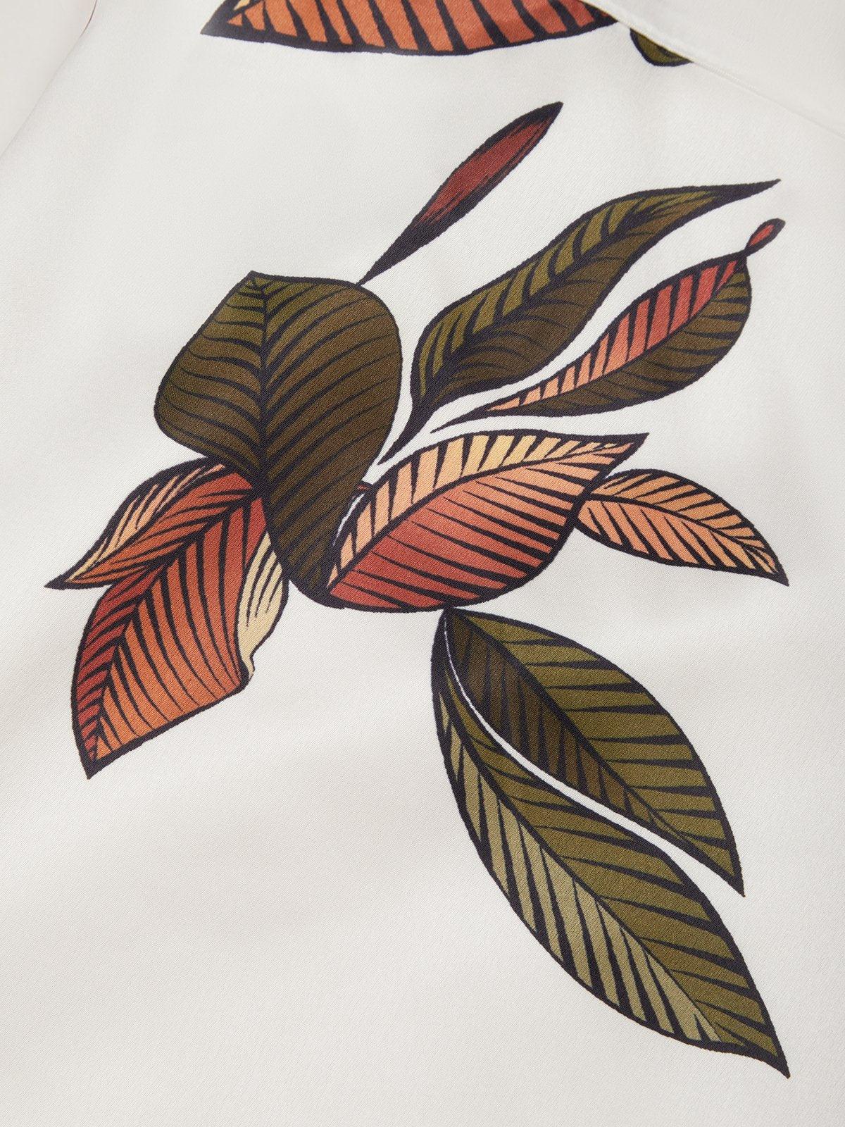 Sanne | Elegant midi dress with short sleeves and a subtle leaf print